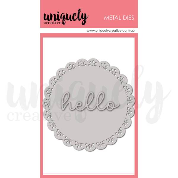 Delicate round doily metal die featuring a scalloped edge with small cut out floral details and a decorative hello script sentiment in the centre.