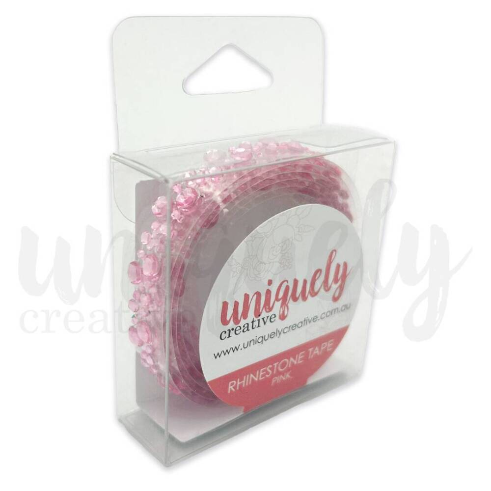 Pink rhinestone tape by Uniquely Creative in clear retail packaging, featuring multiple rolls of adhesive gem strips with faceted pink stones in varying sizes.